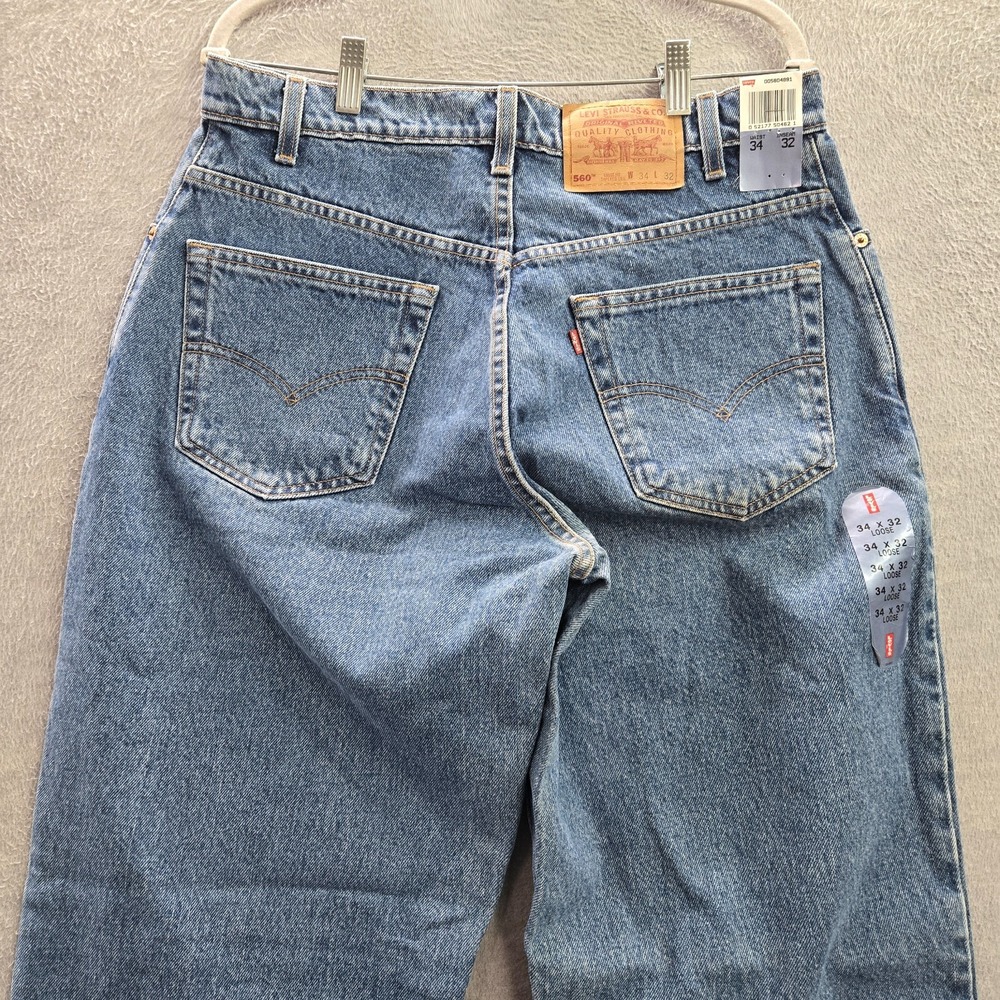 VINTAGE Levi's 560 Men Jeans 34x32 Blue 90s Denim Loose Fit Taper Deadstock NWT - Picture 9 of 12